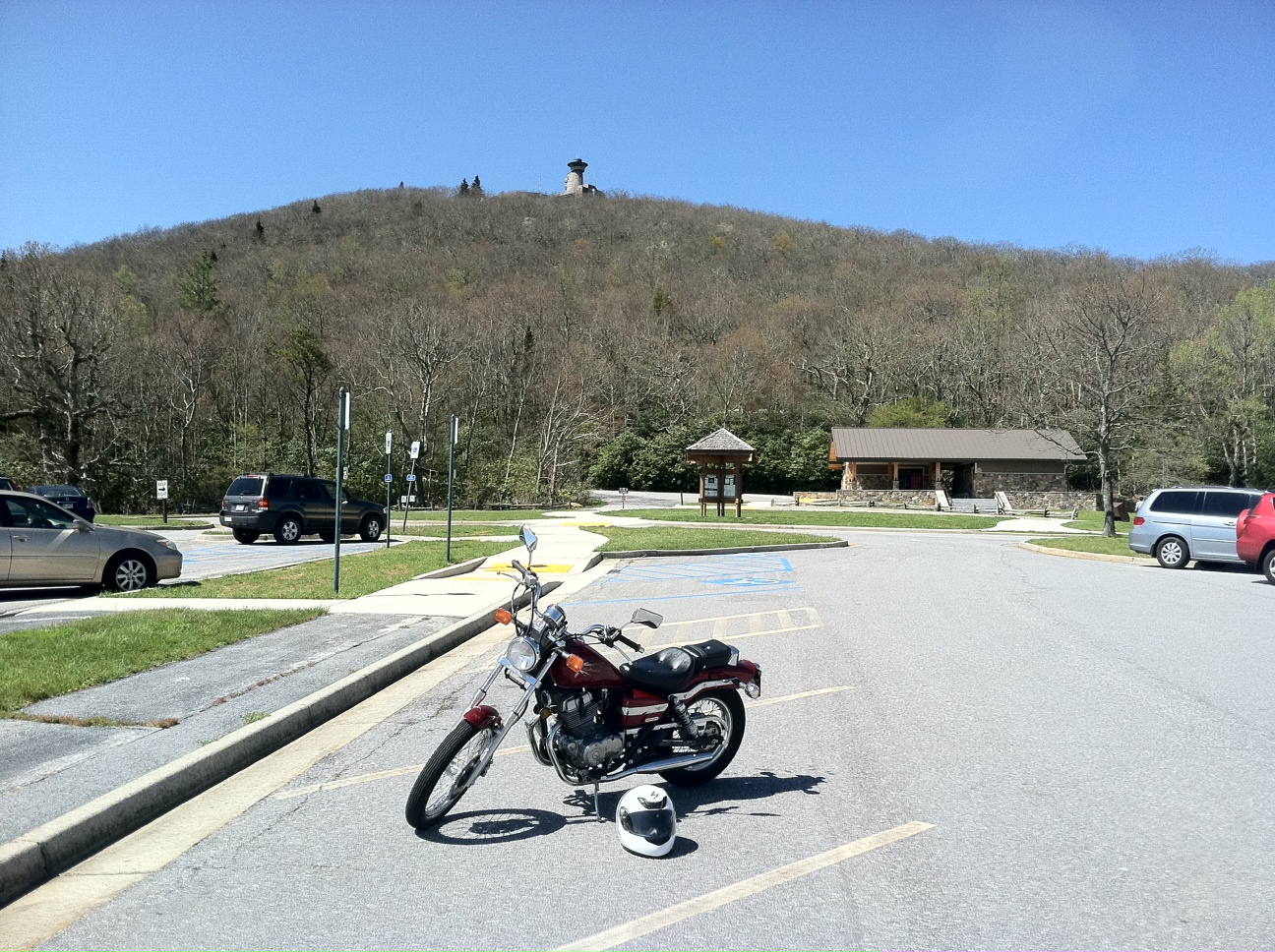 candy red 2012 Honda Rebel motorcycle in parking lot at Brasstown Bald